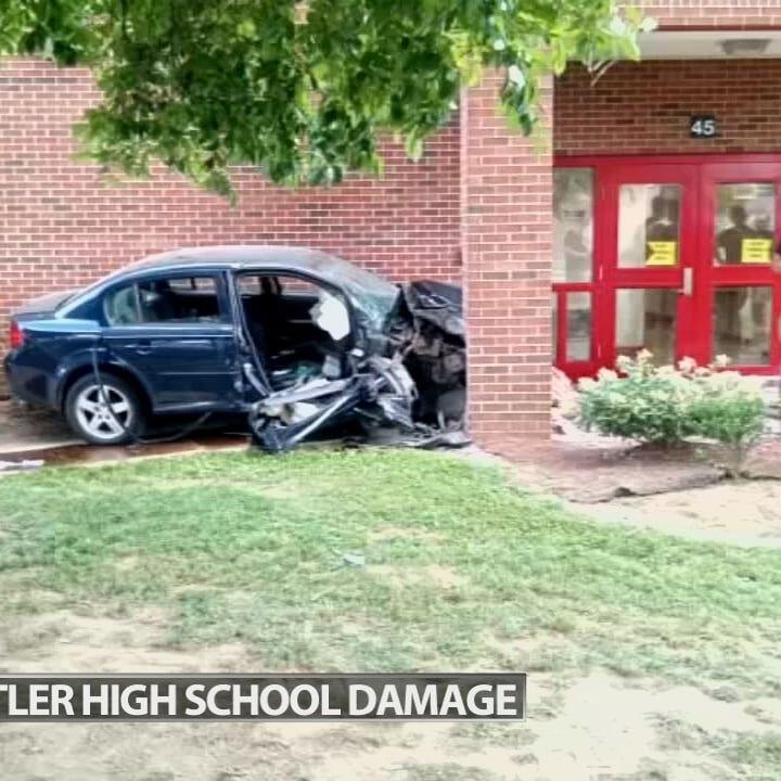 Car crashes into Louisville high school causing minor damage, driver injured